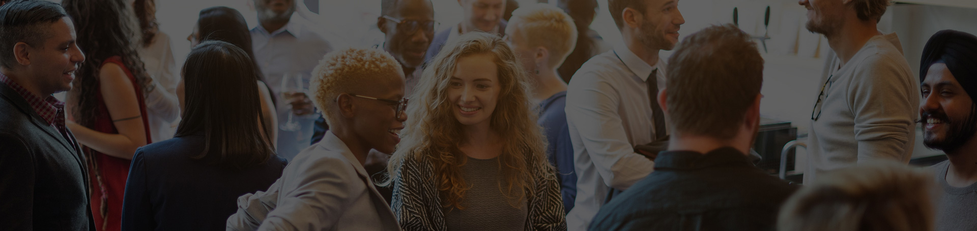 Group of professionals networking at an event
