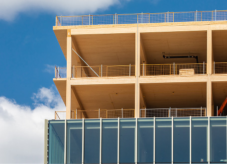 Modern building under construction with balconies